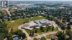 Aerial perspective highlighting the property within a residential area - 