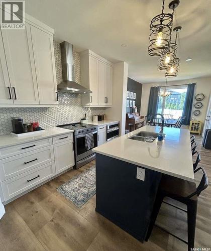 3743 Gee Crescent, Regina, SK - Indoor Photo Showing Kitchen With Double Sink With Upgraded Kitchen