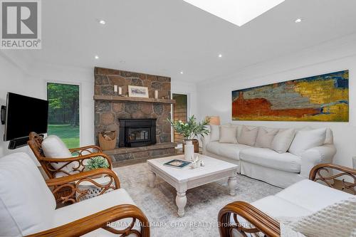 1319 Wolf Circle, Algonquin Highlands, ON - Indoor Photo Showing Living Room With Fireplace