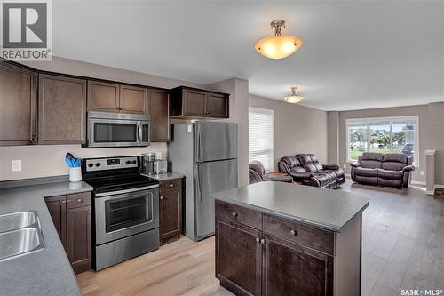 68 4850 Harbour Landing Drive, Regina, SK - Indoor Photo Showing Kitchen
