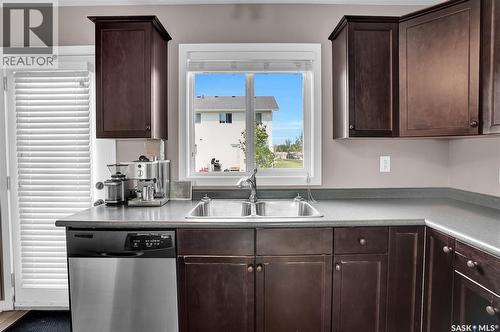 68 4850 Harbour Landing Drive, Regina, SK - Indoor Photo Showing Kitchen With Double Sink