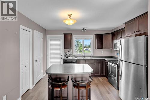 68 4850 Harbour Landing Drive, Regina, SK - Indoor Photo Showing Kitchen With Double Sink
