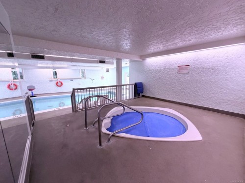 #220-3225 Eldon Pl, Saanich, BC - Indoor Photo Showing Other Room With In Ground Pool