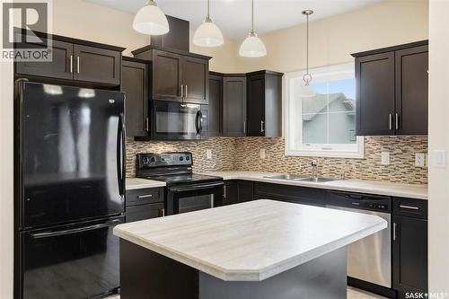 305 315 Zary Road, Saskatoon, SK - Indoor Photo Showing Kitchen With Double Sink With Upgraded Kitchen