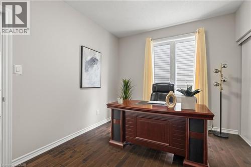 Room with wood-finish flooring, light-toned wall paint, and white baseboards - 96 Damselfly Way, Ottawa, ON - Indoor Photo Showing Office