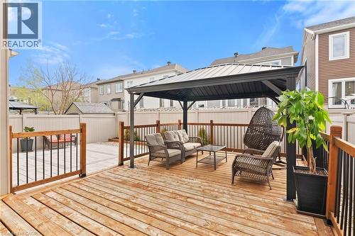 Expansive wooden deck with a built-in gazebo featuring a metal roof - 96 Damselfly Way, Ottawa, ON - Outdoor With Deck Patio Veranda With Exterior