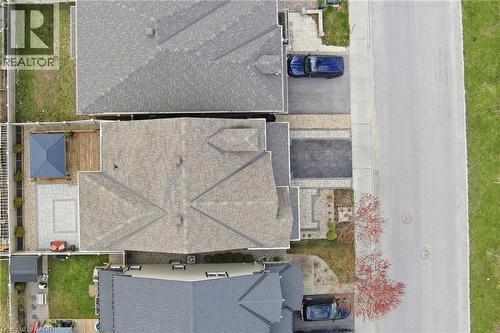 Expansive paved driveway and walkway providing ample parking and access to the residence - 96 Damselfly Way, Ottawa, ON - Outdoor