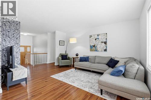 80 Cameron Crescent, Regina, SK - Indoor Photo Showing Living Room With Fireplace
