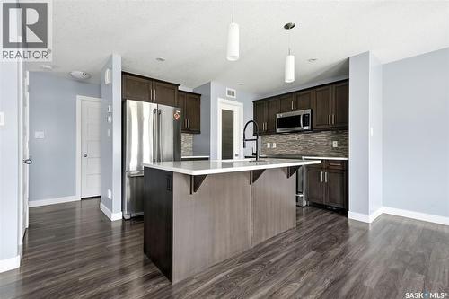 4354 Green Olive Way E, Regina, SK - Indoor Photo Showing Kitchen With Upgraded Kitchen