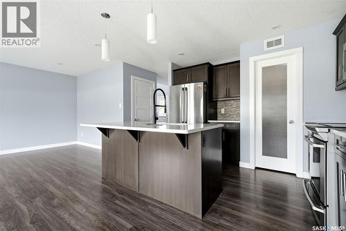 4354 Green Olive Way E, Regina, SK - Indoor Photo Showing Kitchen With Upgraded Kitchen