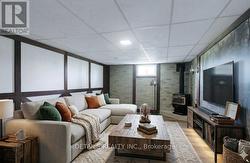 Virtually staged-Comfy room for family time. - 