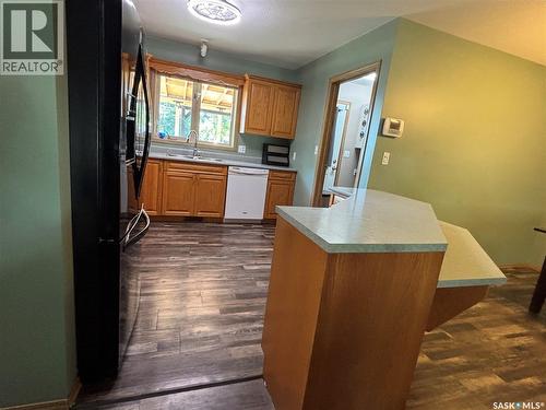 208 Herbert Street, Maple Creek, SK - Indoor Photo Showing Kitchen With Double Sink