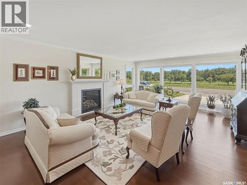 1165 North Hill Drive, Swift Current, SK - Indoor Photo Showing Living Room With Fireplace