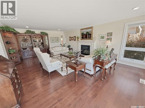 1165 North Hill Drive, Swift Current, SK - Indoor Photo Showing Living Room With Fireplace