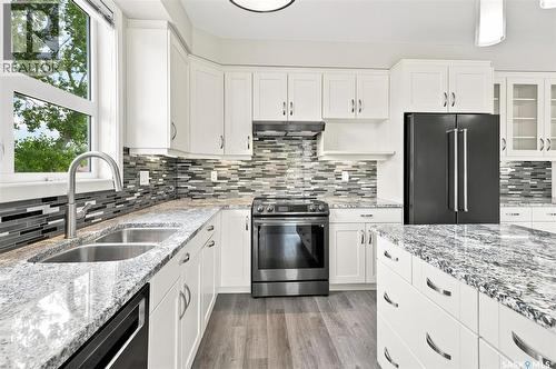 210 1015 Moss Avenue, Saskatoon, SK - Indoor Photo Showing Kitchen With Double Sink With Upgraded Kitchen