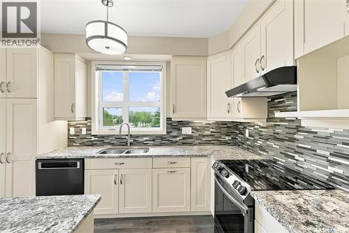 210 1015 Moss Avenue, Saskatoon, SK - Indoor Photo Showing Kitchen With Double Sink