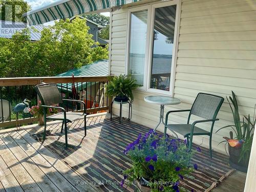 Back Deck overlooking Rice Lake - 40 Ivey Lane, Otonabee-South Monaghan, ON - Outdoor With Deck Patio Veranda With Exterior