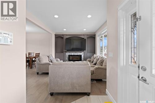 526 Maple Crescent, Warman, SK - Indoor With Fireplace