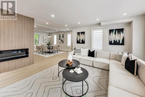 58 Forsyth Avenue N, Hamilton, ON - Indoor Photo Showing Living Room With Fireplace