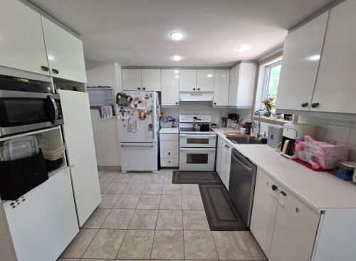 Kitchen - 5490 Av. Bienville, Brossard, QC - Indoor Photo Showing Kitchen