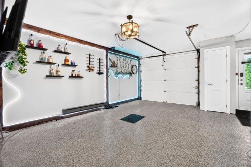 Garage - 53 Rue Beaudry N., Joliette, QC - Indoor Photo Showing Garage