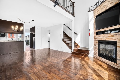 Salon - 53 Rue Beaudry N., Joliette, QC - Indoor With Fireplace