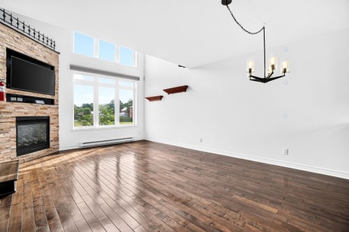Salle à manger - 53 Rue Beaudry N., Joliette, QC - Indoor With Fireplace