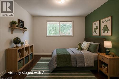 Bedroom featuring a paneled accent wall, wood-finish flooring, and a single window with white trim - 109 White Oak Place, Waterloo, ON - Indoor Photo Showing Bedroom
