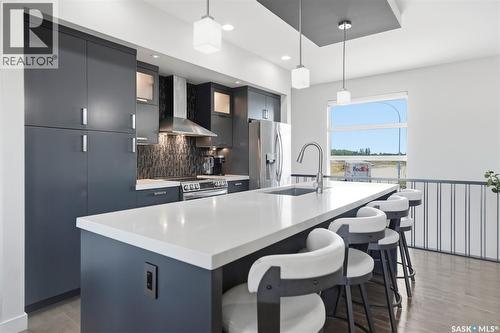 727 1St Avenue N, Warman, SK - Indoor Photo Showing Kitchen With Upgraded Kitchen