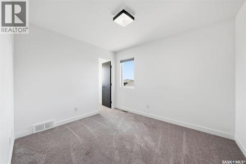 727 1St Avenue N, Warman, SK - Indoor Photo Showing Other Room
