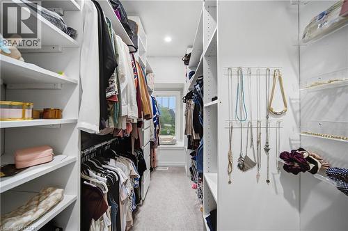 Walk-in closet featuring built-in shelving, hanging rods, an integrated window seat, and recessed lighting - 750 Lawrence Street Unit# 38, Cambridge, ON - Indoor With Storage