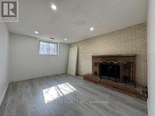 220 John Tabor Trail, Toronto, ON - Indoor Photo Showing Living Room With Fireplace