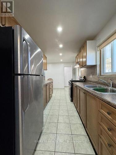220 John Tabor Trail, Toronto, ON - Indoor Photo Showing Kitchen With Double Sink
