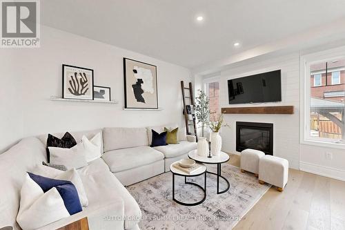 33 Kettle Valley Trail, King, ON - Indoor Photo Showing Living Room With Fireplace