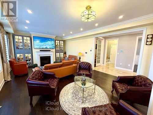 Built-in wall speakers with displays - 56 Esther Crescent, Thorold, ON - Indoor Photo Showing Living Room With Fireplace