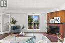 426 425 115Th Street E, Saskatoon, SK  - Indoor Photo Showing Living Room With Fireplace 