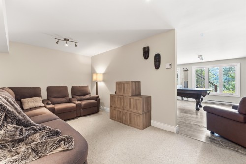 Family Room - 90 Ch. Des Catalpas, La Conception, QC - Indoor Photo Showing Living Room