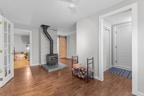 Sous-sol - 11 Rue Sunnyview, Morin-Heights, QC - Indoor With Fireplace