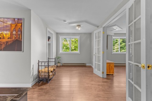 Sous-sol - 11 Rue Sunnyview, Morin-Heights, QC - Indoor Photo Showing Other Room