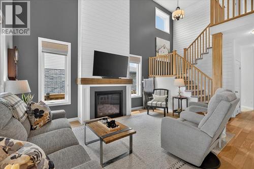 87 Boyd Boulevard, Zorra, ON - Indoor Photo Showing Living Room With Fireplace