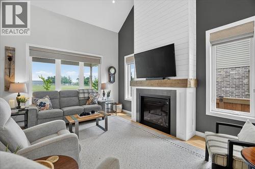 87 Boyd Boulevard, Zorra, ON - Indoor Photo Showing Living Room With Fireplace