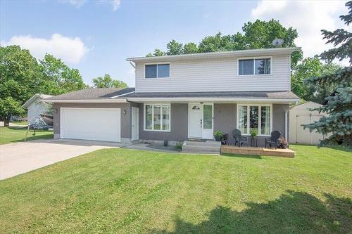 4 Schultz Rd, Pinawa, MB - Outdoor With Deck Patio Veranda With Facade