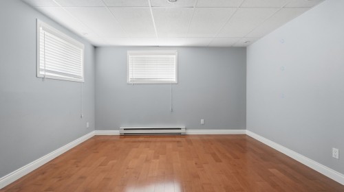 Salle familiale - 1290 159E Rue, Saint-Georges, QC - Indoor Photo Showing Other Room