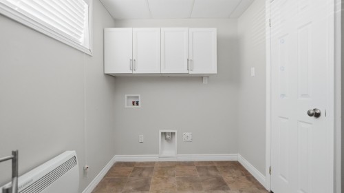 Salle de lavage - 1290 159E Rue, Saint-Georges, QC - Indoor Photo Showing Other Room