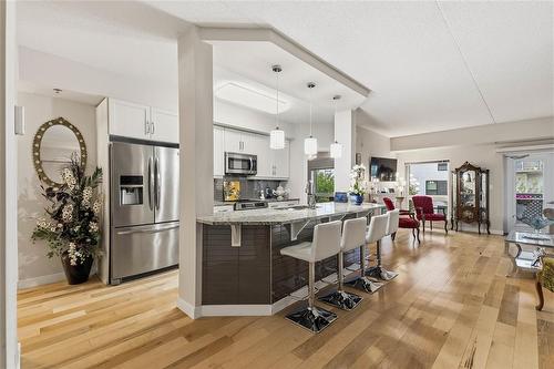 212 775 Sterling Lyon Parkway, Winnipeg, MB - Indoor Photo Showing Kitchen With Stainless Steel Kitchen With Upgraded Kitchen