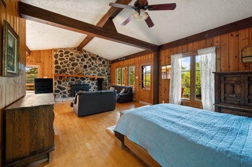 Chambre à coucher principale - 5300 Crois. St-Norbert, Val-Morin, QC - Indoor Photo Showing Other Room With Fireplace
