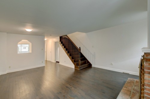 Salon - 521 Rue Hyman, Dollard-Des-Ormeaux, QC - Indoor With Fireplace