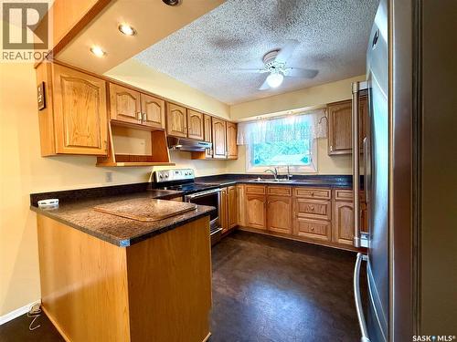 1317 Main Street, Canora, SK - Indoor Photo Showing Kitchen With Double Sink