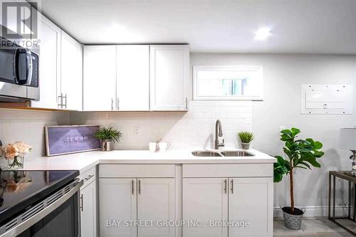 351 East 27Th Street, Hamilton, ON - Indoor Photo Showing Kitchen With Double Sink