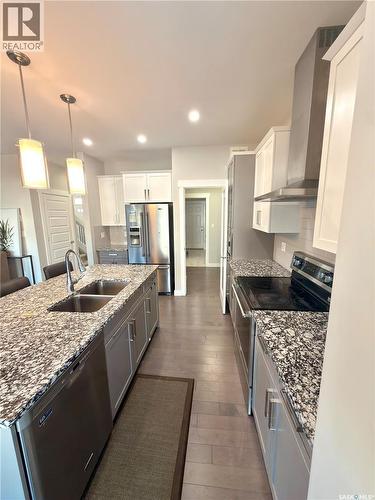 539 Secord Manor, Saskatoon, SK - Indoor Photo Showing Kitchen With Stainless Steel Kitchen With Double Sink With Upgraded Kitchen